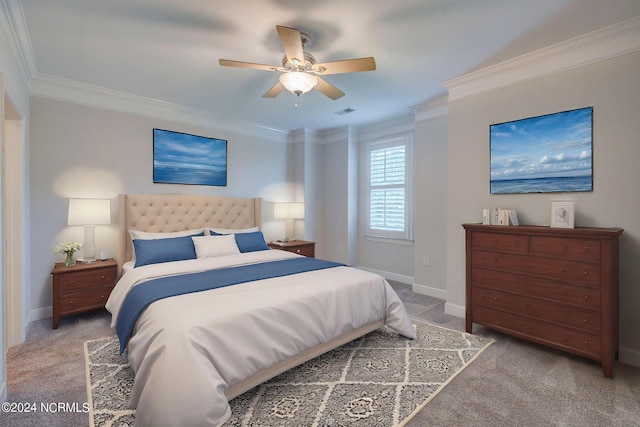 carpeted bedroom with crown molding and ceiling fan