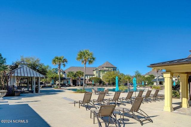 exterior space with a gazebo and a patio area