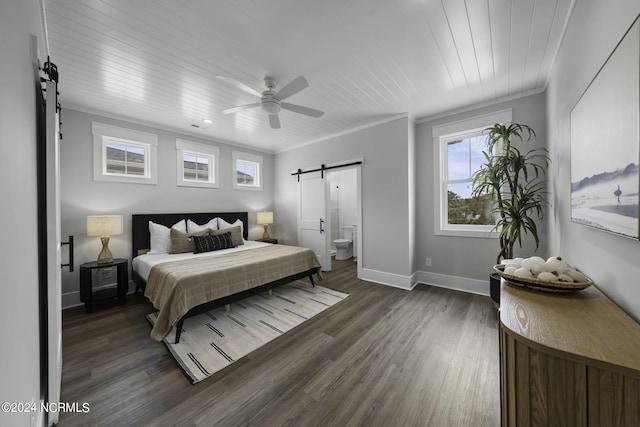 bedroom featuring a barn door, dark hardwood / wood-style flooring, ornamental molding, ceiling fan, and wooden ceiling