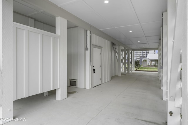 hallway featuring concrete flooring