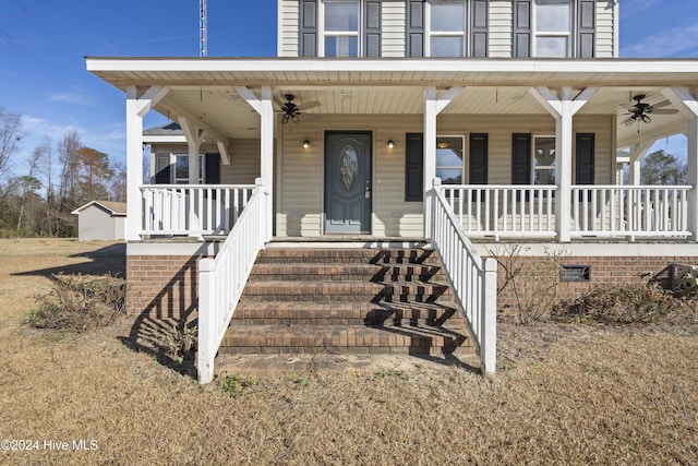 view of front facade with ceiling fan and covered porch