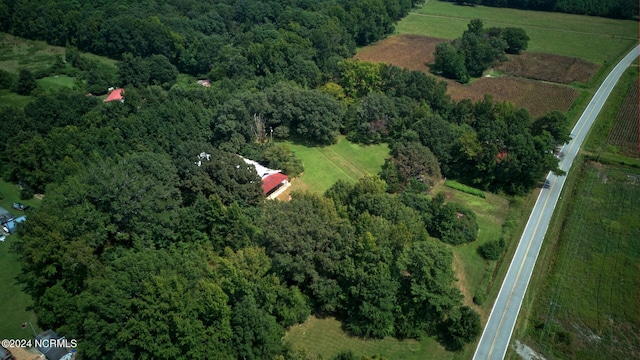 birds eye view of property with a rural view