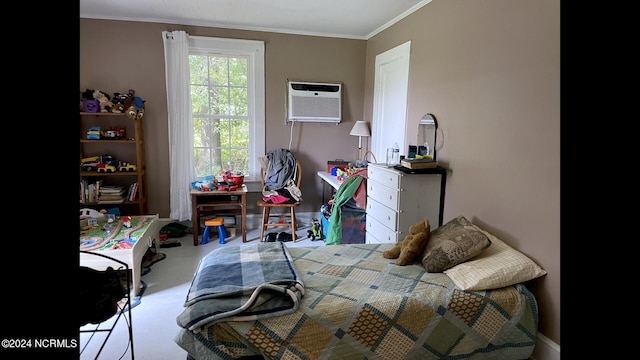 bedroom featuring ornamental molding, carpet, and a wall unit AC