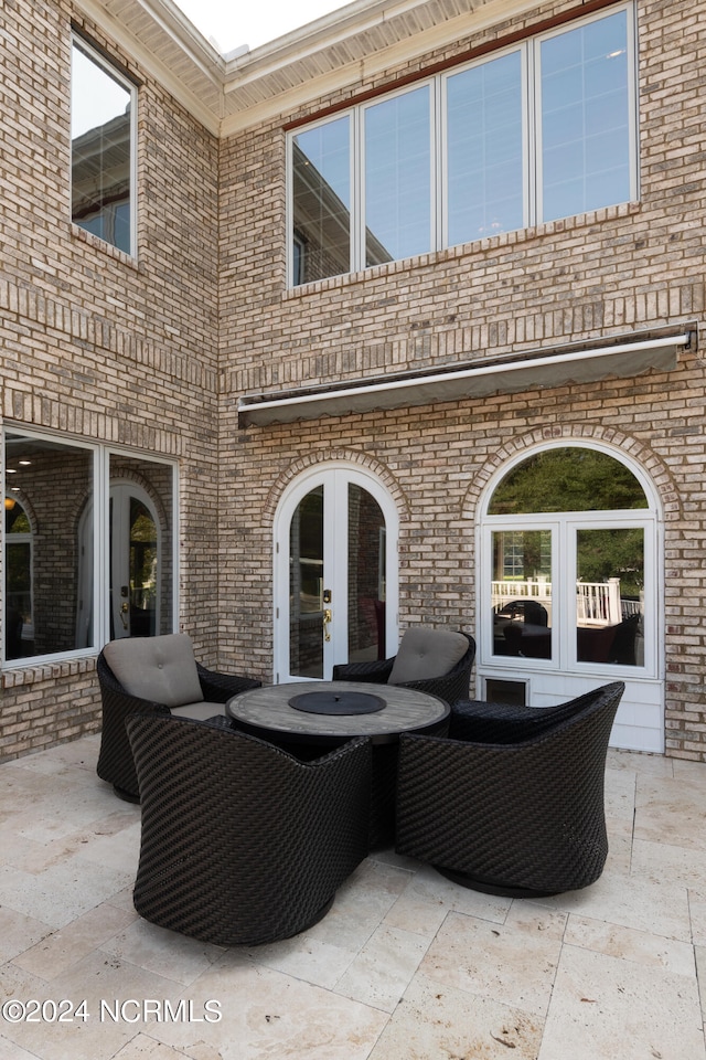 view of patio / terrace featuring an outdoor hangout area and french doors