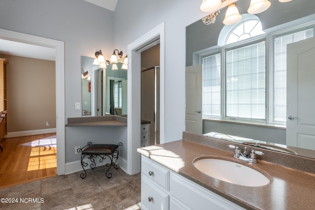 bathroom featuring vanity and hardwood / wood-style flooring