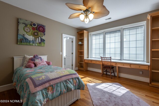 bedroom featuring ceiling fan and light hardwood / wood-style floors