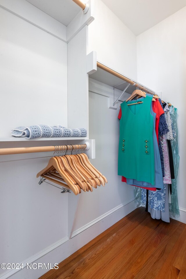 walk in closet featuring wood-type flooring