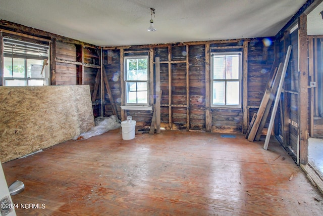 misc room featuring a textured ceiling and plenty of natural light