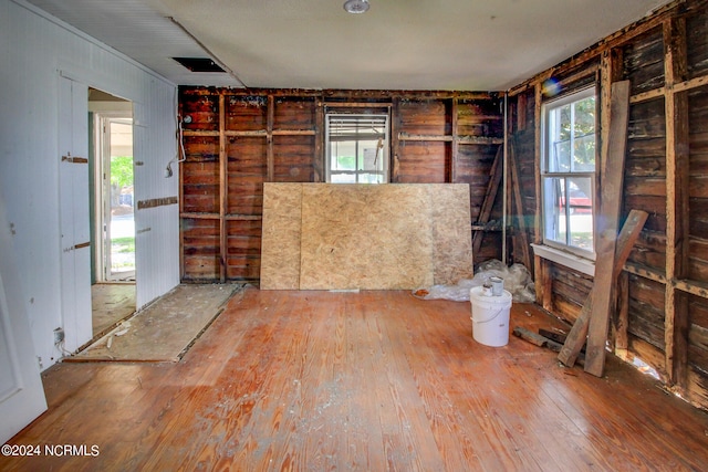 interior space with hardwood / wood-style flooring and plenty of natural light