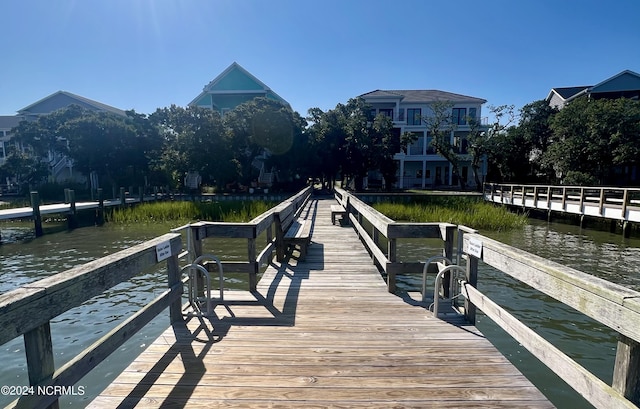 view of dock with a water view