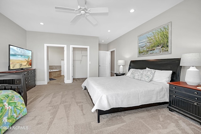 bedroom with light carpet, baseboards, connected bathroom, ceiling fan, and recessed lighting