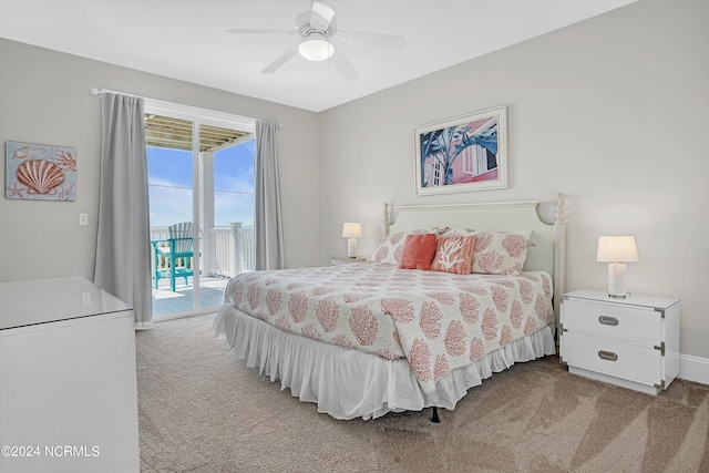 bedroom with access to exterior, ceiling fan, and carpet flooring