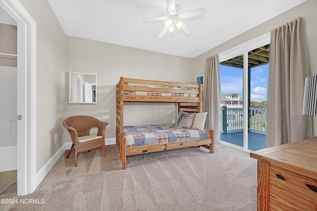 bedroom with baseboards, carpet floors, ceiling fan, and access to exterior