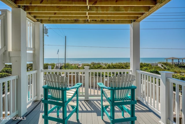 deck featuring a water view