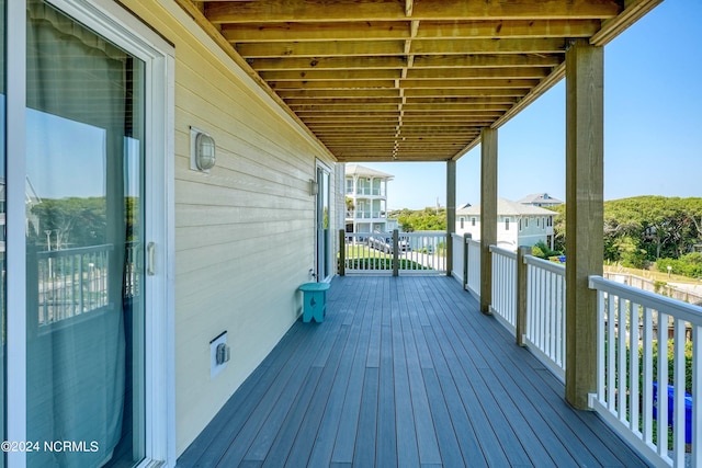 wooden terrace featuring a residential view