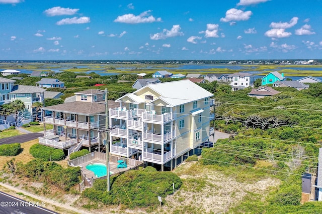 birds eye view of property with a residential view