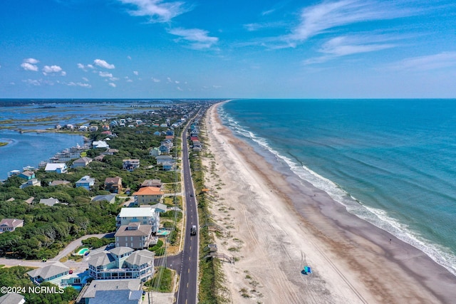 aerial view with a view of the beach and a water view