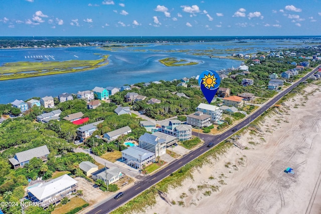 bird's eye view with a water view