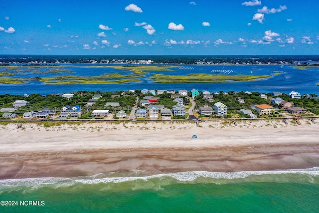 aerial view with a beach view and a water view