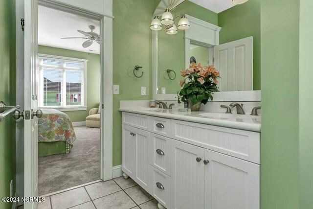 bathroom featuring vanity, ceiling fan, and tile patterned floors