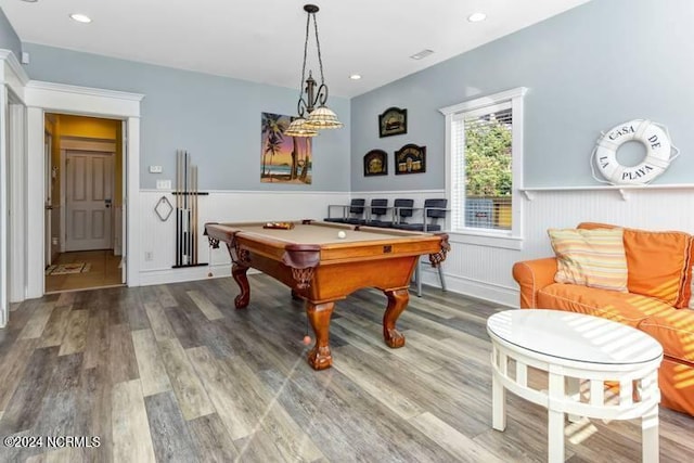 rec room with a wainscoted wall, billiards, and wood finished floors