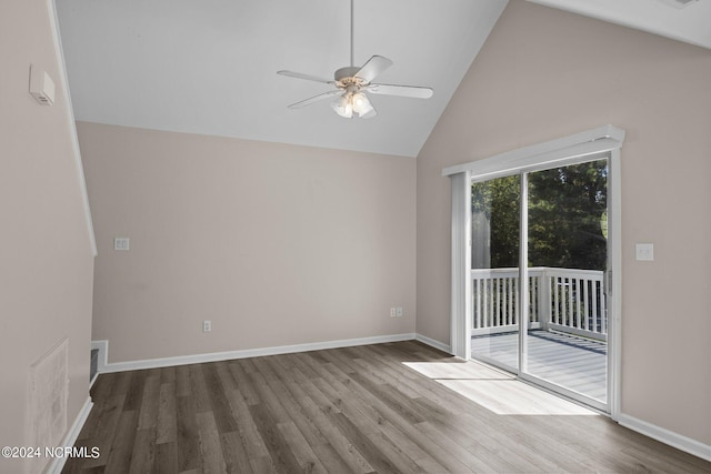 unfurnished room featuring ceiling fan, high vaulted ceiling, and hardwood / wood-style flooring