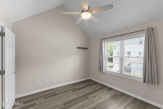 unfurnished room featuring wood-type flooring, ceiling fan, and lofted ceiling