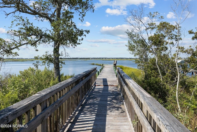 view of dock with a water view