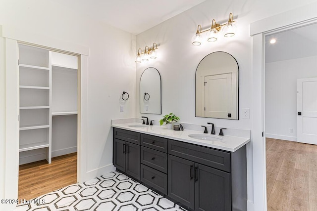 bathroom featuring hardwood / wood-style floors and vanity