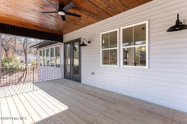 deck featuring french doors and ceiling fan