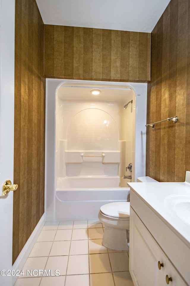 full bathroom with shower / washtub combination, vanity, toilet, and tile patterned floors