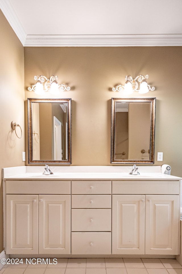 bathroom with ornamental molding, tile patterned flooring, and vanity