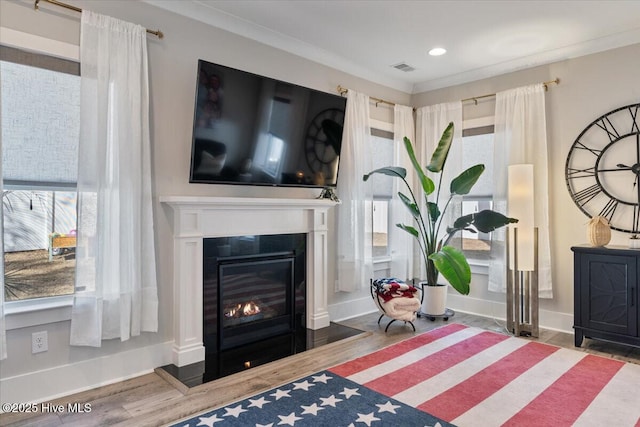 living area with hardwood / wood-style flooring