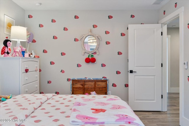 bedroom featuring light hardwood / wood-style floors