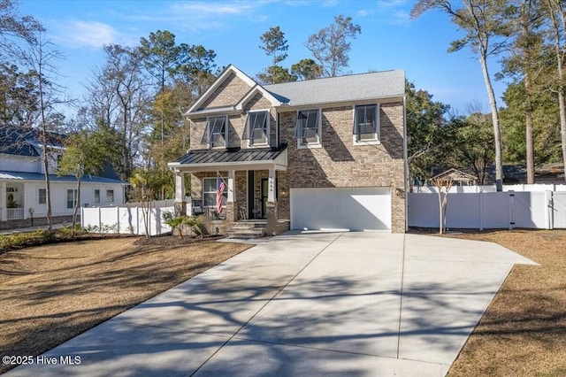 craftsman-style home with a garage and covered porch