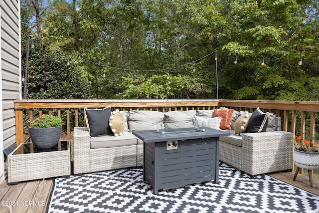 deck featuring outdoor lounge area