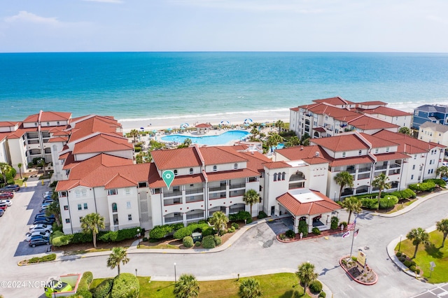 aerial view featuring a water view and a residential view