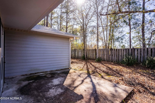 view of yard with a patio area and fence