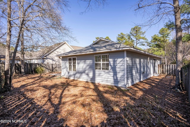 view of home's exterior with a fenced backyard