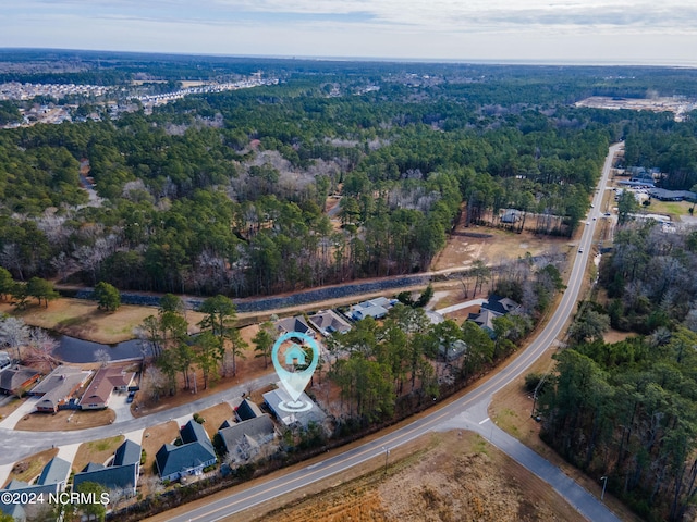 aerial view featuring a view of trees