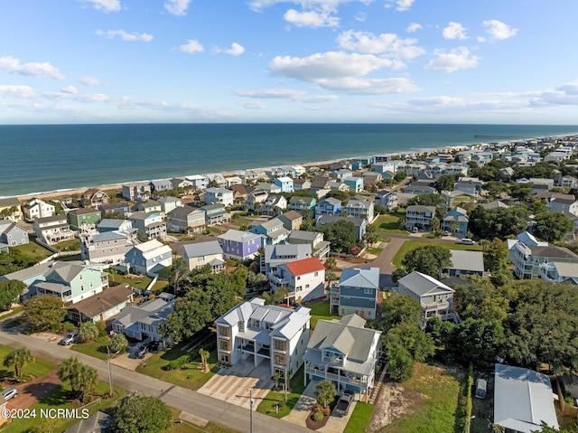 birds eye view of property featuring a water view and a residential view