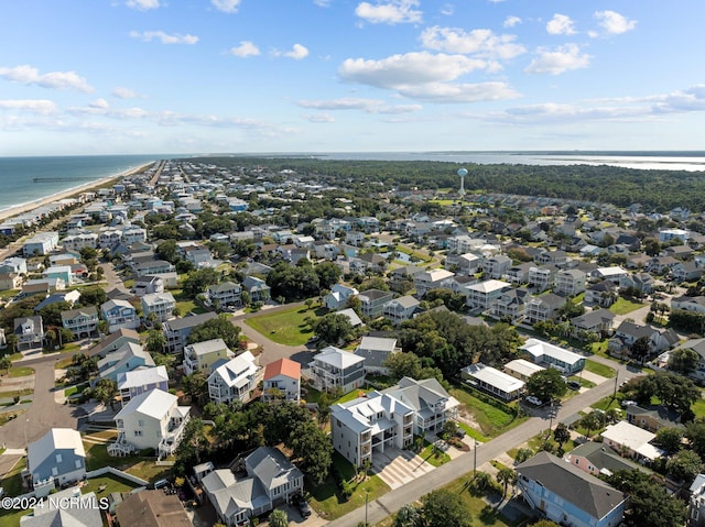 birds eye view of property with a residential view and a water view