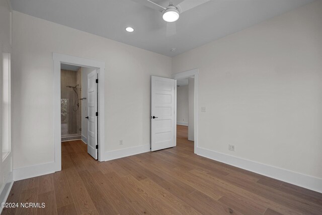 unfurnished bedroom featuring ceiling fan and light wood-type flooring