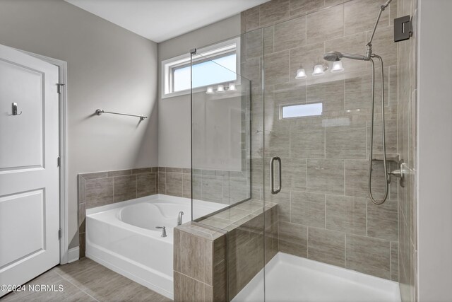 bathroom with plus walk in shower