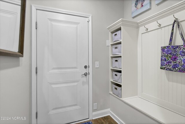 mudroom with dark hardwood / wood-style floors