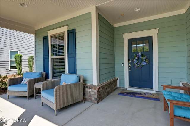 entrance to property with covered porch