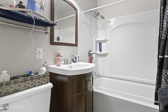 full bath with toilet, shower / tub combo with curtain, and vanity