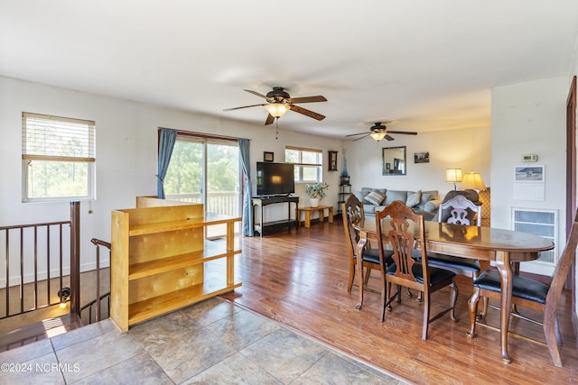 dining area with wood finished floors