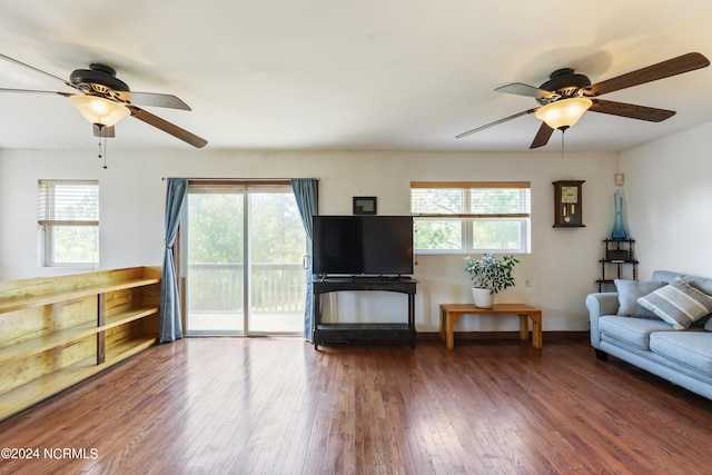 unfurnished living room with ceiling fan and wood-type flooring