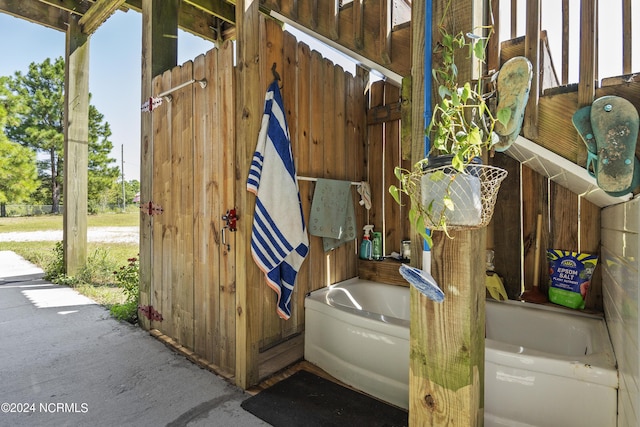 exterior space with a garden tub